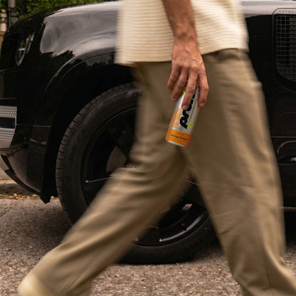Walking past a Defender holding Prox Orange Dream
